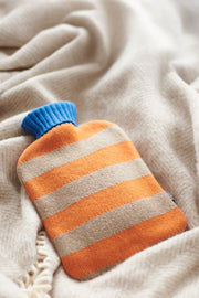 Orange mushroom and blue striped hot water bottle cover